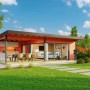 Lasita Maja Ferienhaus Domeo 10, schwedenrot, mit Anbau und Terrasse im Garten.