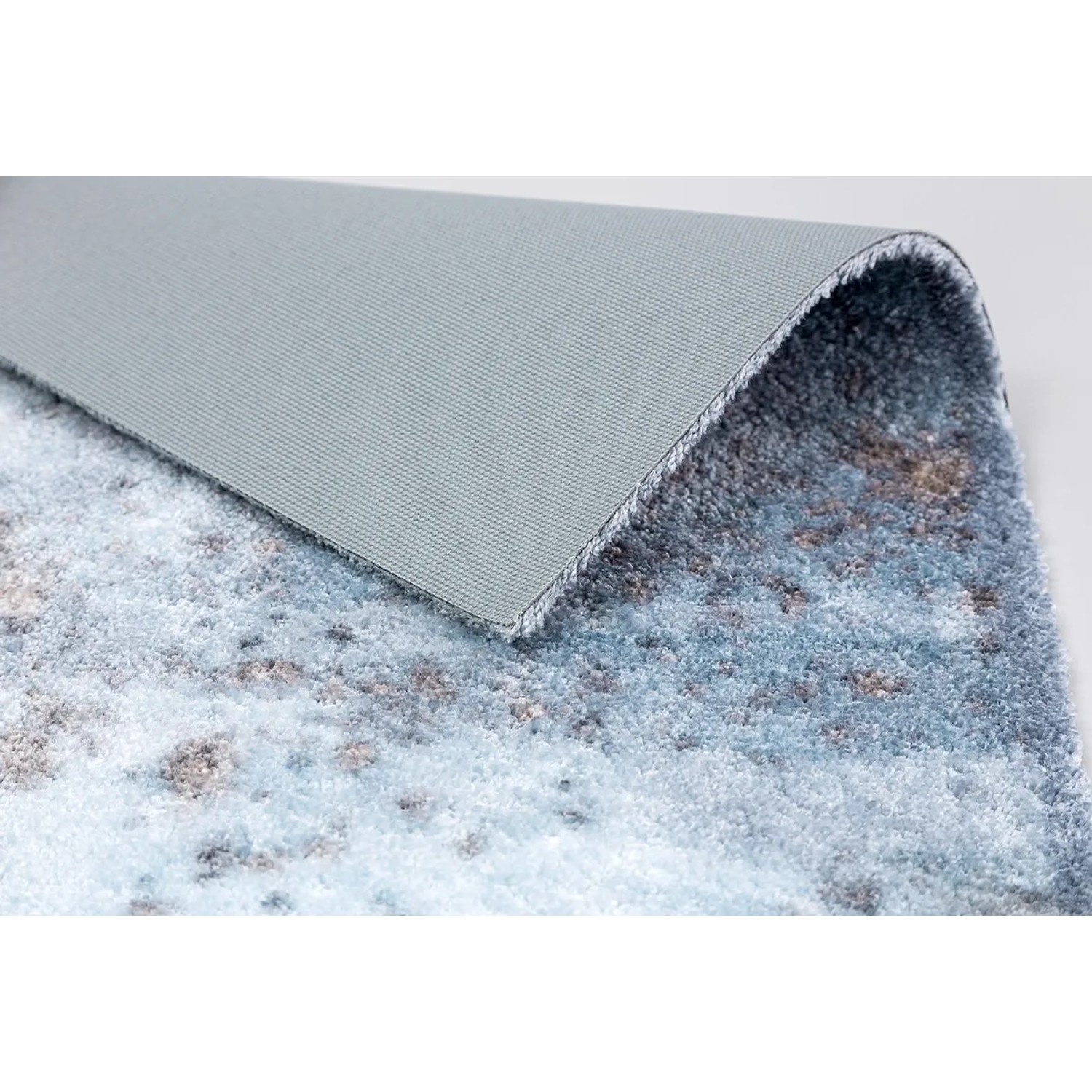 Astra Sauberlaufmatte Pure und Soft, 50x70 cm, Beton Hellblau, Detailansicht der Rückseite.