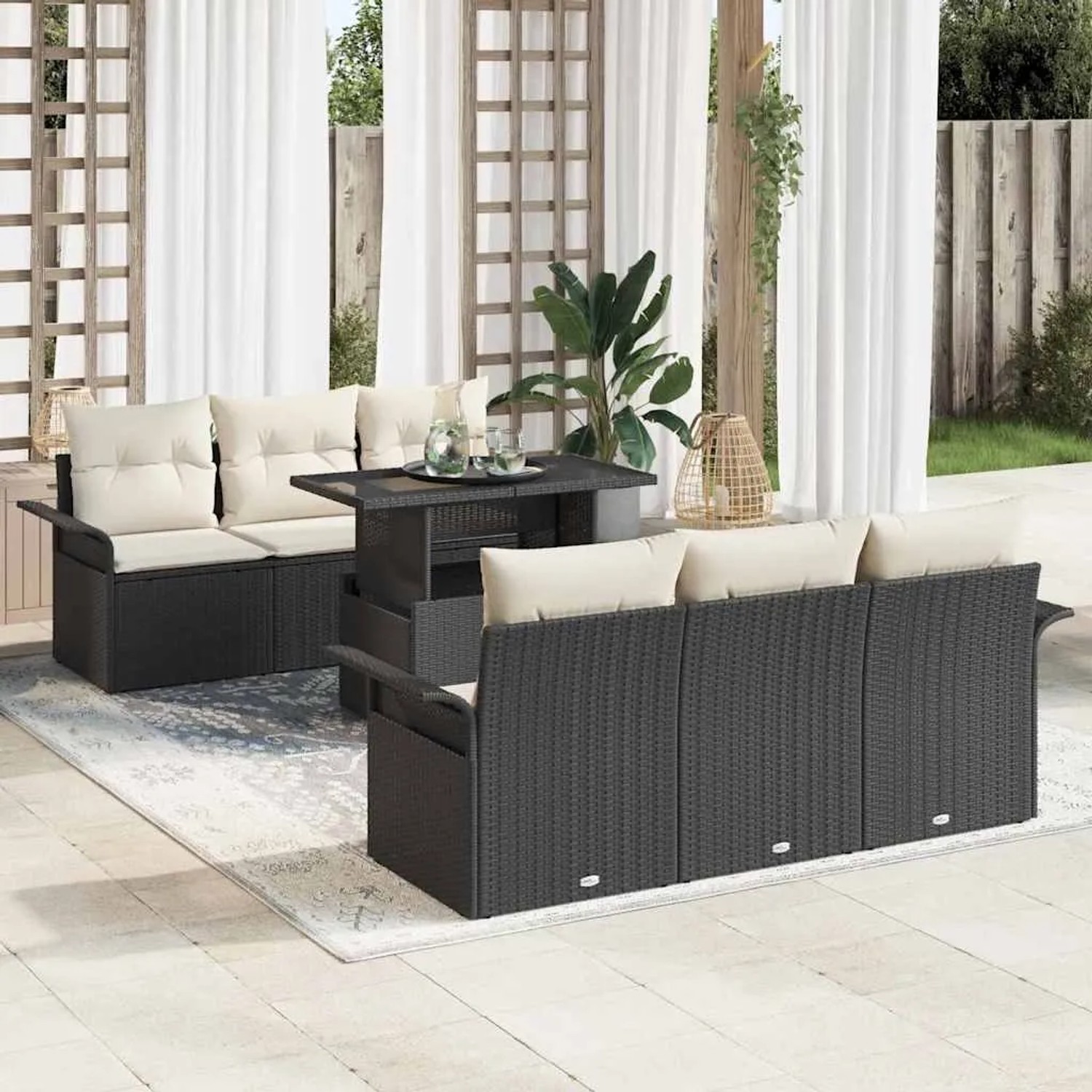 Schwarzes 7-teiliges vidaXL Garten-Sofa-Set aus Poly Rattan mit Kissen.
