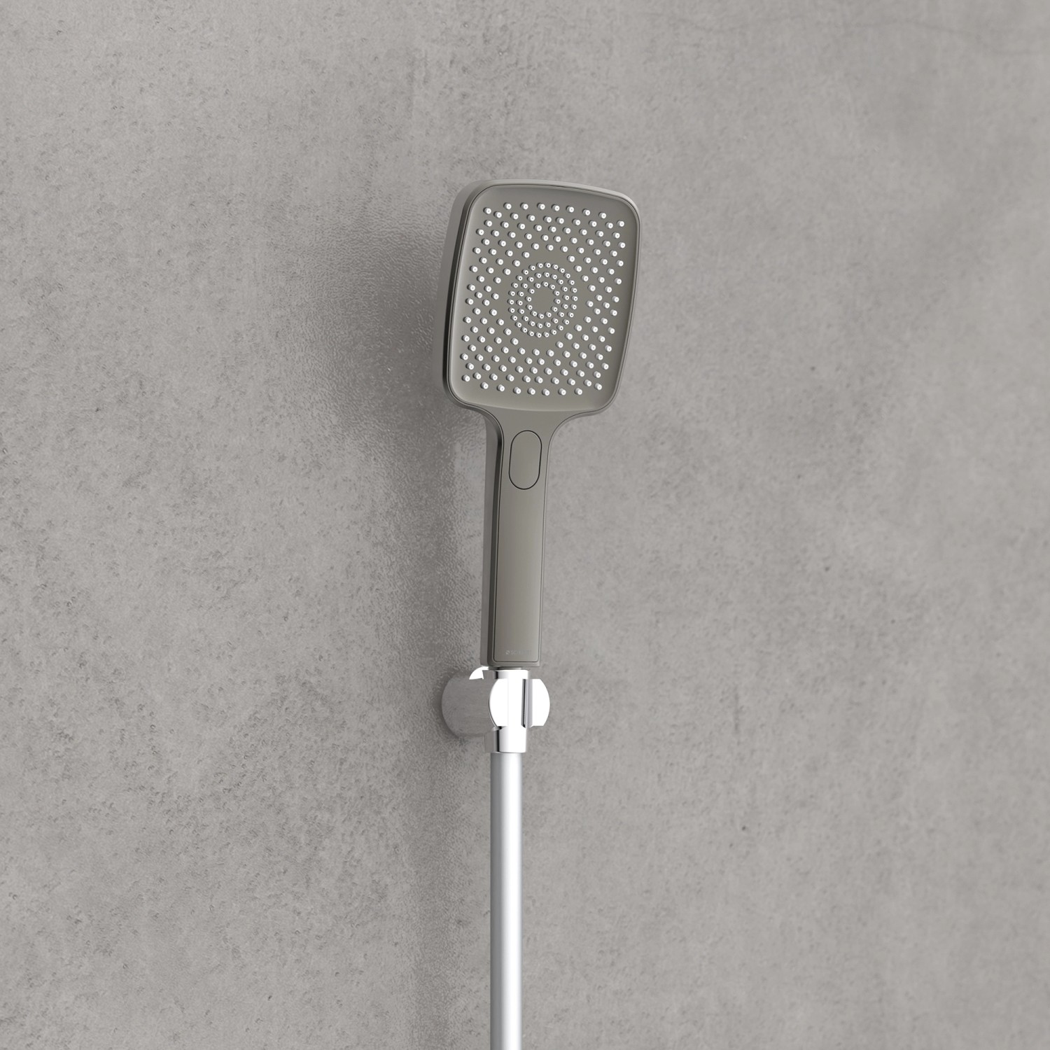 Schütte Handbrause Hawaii, eckig, graphit matt, mit Brauseschlauch an grauer Wand.