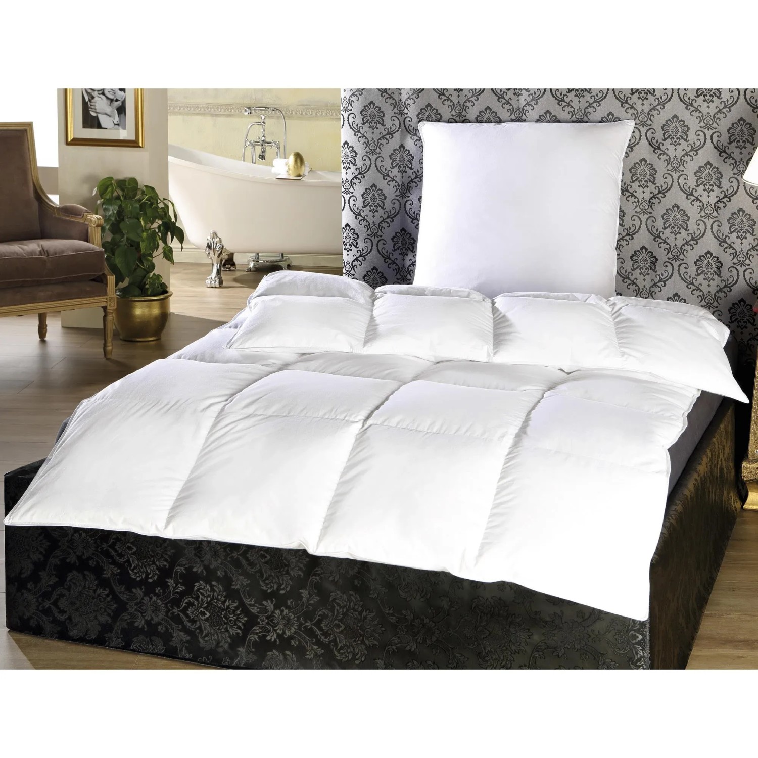 Bestlivings Kassettenbett Daunen&Federdecke 135x200cm mit Kissen auf einem Bett.