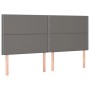 Graues vidaXL Boxspringbett Kopfteil mit Kunstlederbezug und Ziernägeln.