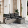 Graue 4-tlg. vidaXL Garten-Sofagarnitur aus Rattan mit dunklen Kissen auf einem gemusterten Teppich.