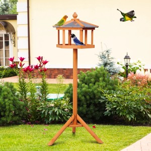PawHut Vogelhaus mit Ständer und Zinkdach im Garten.