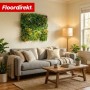 Dekorative Floordirekt Pflanzenwand Spring Garden 100x100 cm mit vielfältigen grünen Kunstpflanzen an einer hellen Wohnzimmerwand.