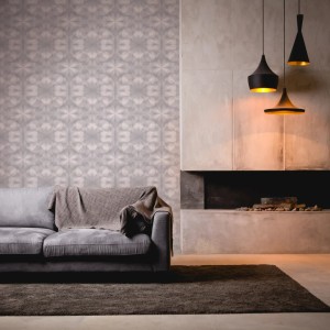 Helle Vliestapete mit 3D-Design, leicht glänzend und strukturiert im Wohnzimmer.