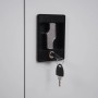 Zylinderschloss mit Schlüssel am hellgrauen Aktenschrank. Sicherer Büroschrank für Dokumente.