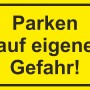 Gelbes Warnschild "Parken auf eigene Gefahr" 25x15cm für Innen- und Außenbereich.