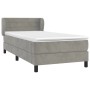 Hellgraues Boxspringbett 80x200 cm mit Samtbezug, inklusive Matratze und Topper.