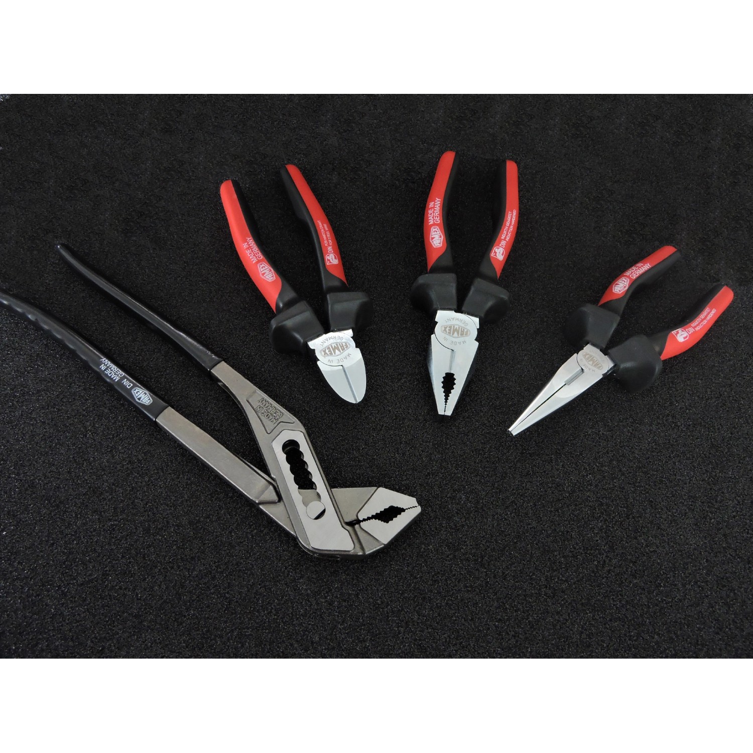 Famex Zangen-Set: Wasserpumpenzange, Kombizange, Seitenschneider, Telefonzange mit roten Griffen.