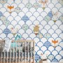 Sanders & Sanders Fototapete Tiere Multicolor 200x250 cm im Kinderzimmer mit Babybett.
