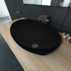 Ovales, schwarzes Keramik Waschbecken von vidaXL, montiert auf einer hellen Holzplatte.