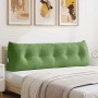 Hellgrünes Samt-Rückenkissen mit Knöpfen auf einem Bett. Ideal als Rückenlehne für Komfort im Schlafzimmer.
