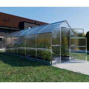 Großes Klasika Greenhouses Bernard Gewächshaus mit Polycarbonatabdeckung und geöffneten Türen.