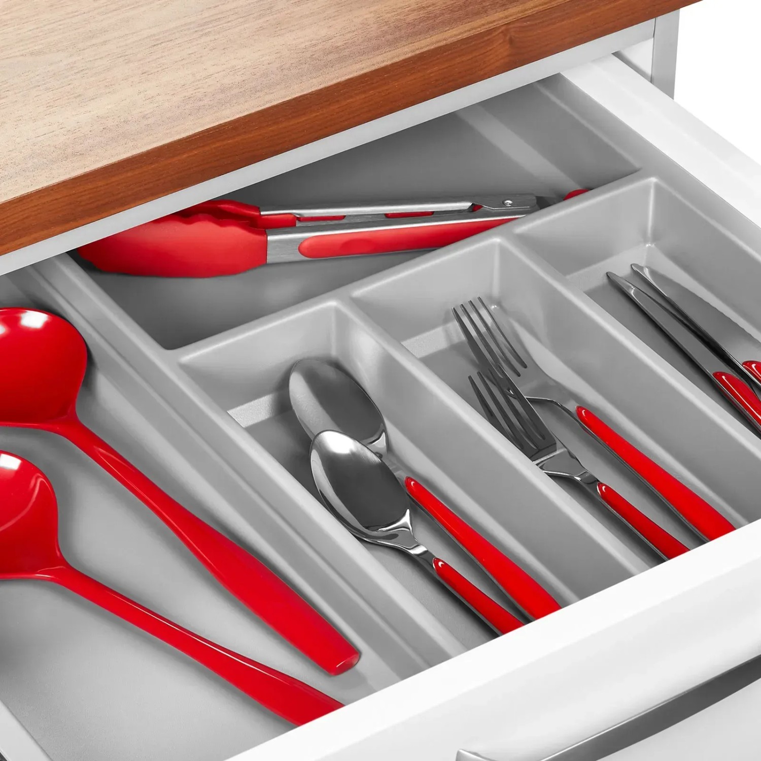 Grauer SOTECH ORGA-BOX VI Besteckeinsatz in offener Küchenschublade, gefüllt mit rotem Besteck.