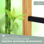 Detailaufnahme: Holz Getränkekistenregal mit Edelstahlablage und Bambusdeko.