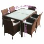 7-tlg. Garten-Essgruppe aus braunem Rattan mit Tisch, 6 Stühlen und cremeweißen Auflagen.