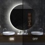 Dekorativer LED Wandspiegel mit warmweißer Beleuchtung im Bad, links an, rechts aus. Modernes Design für Flur oder Bad.