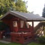 Gartenhaus mit anthrazitfarbenem Weckman Pfannenblech Typ 2 als Dacheindeckung.