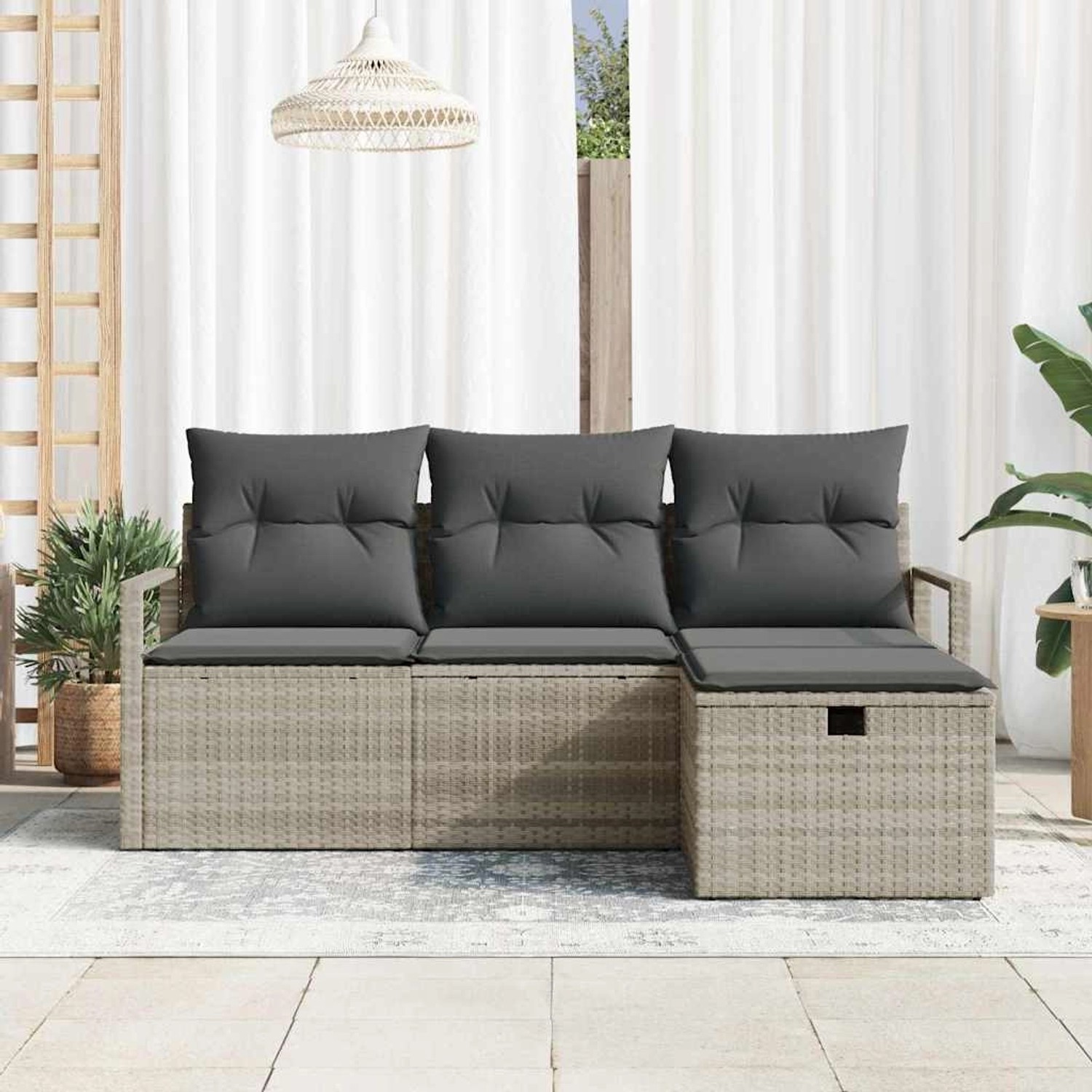 Hellgraues 4-tlg. Garten-Sofa-Set aus Poly Rattan mit grauen Kissen und Stauraum.