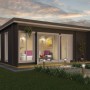 Carbongraues Lasita Maja Gartenhaus Japan mit Pultdach und überdachter Fläche.