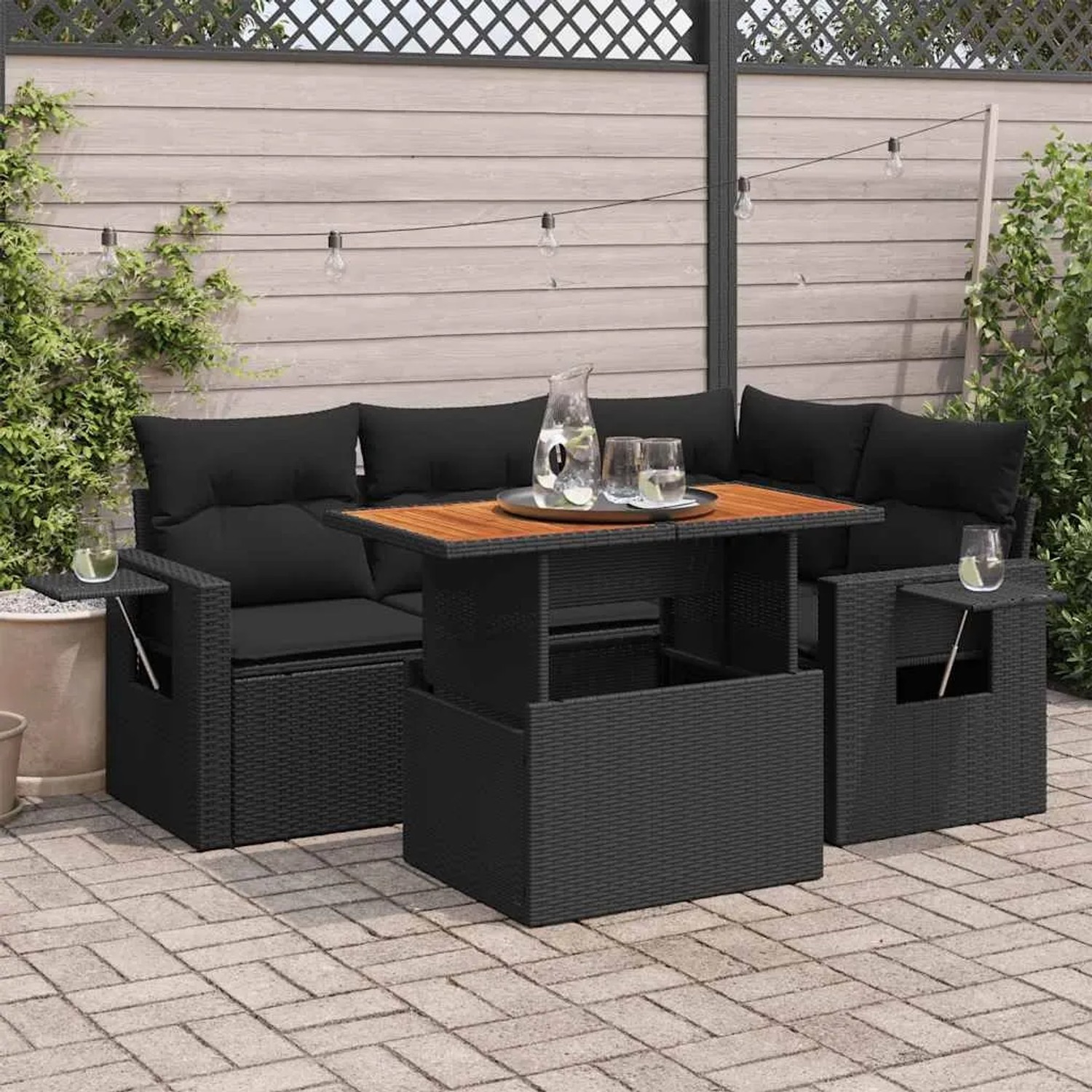 Schwarze 5-tlg. vidaXL Garten-Sofagarnitur aus Poly Rattan mit Tisch und Kissen.