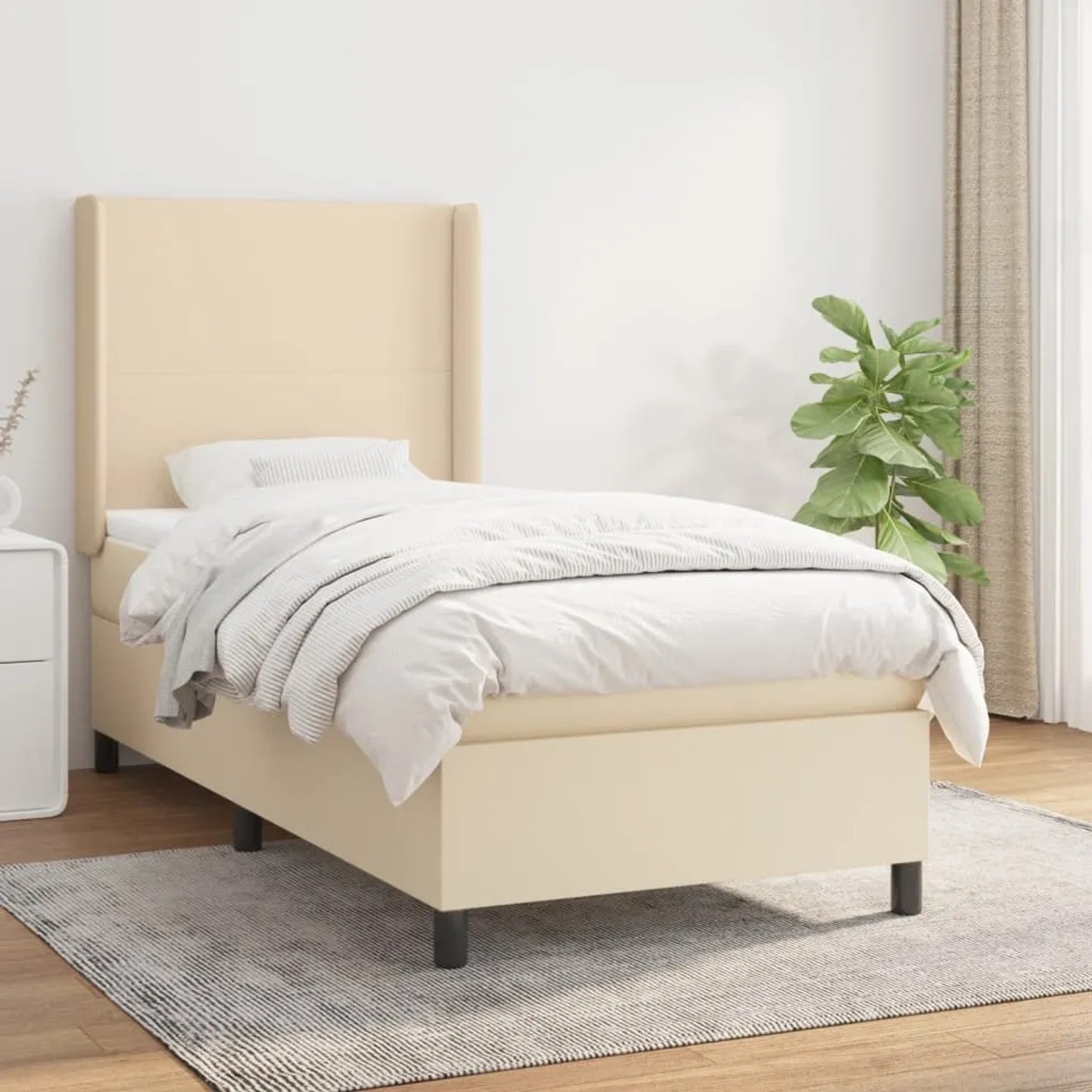 Cremefarbenes vidaXL Boxspringbett (100x200 cm) mit Matratze und hohem Kopfteil.