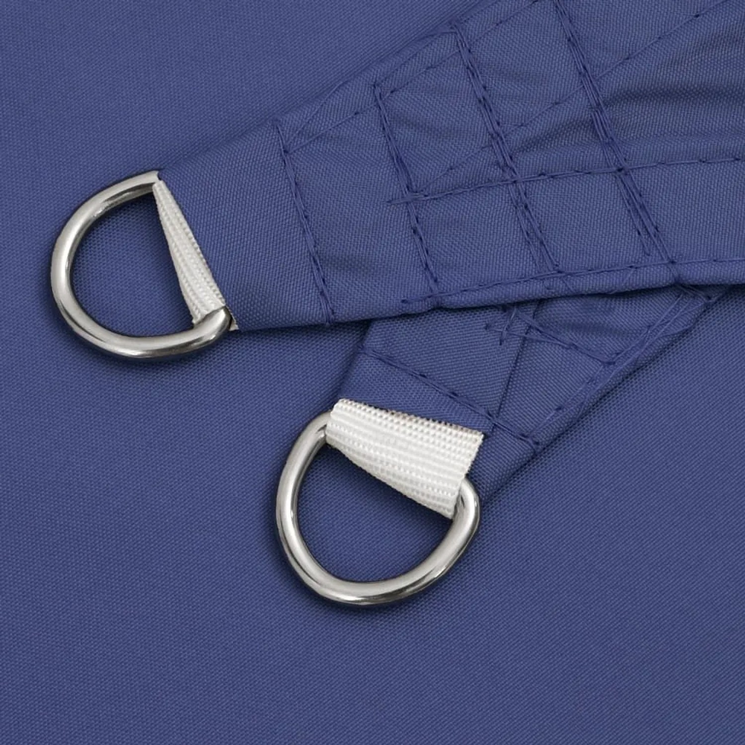 Blaues vidaXL Sonnensegel aus Oxford-Gewebe. Detailansicht der Ecke mit stabilen Edelstahl-D-Ringen zur Befestigung.