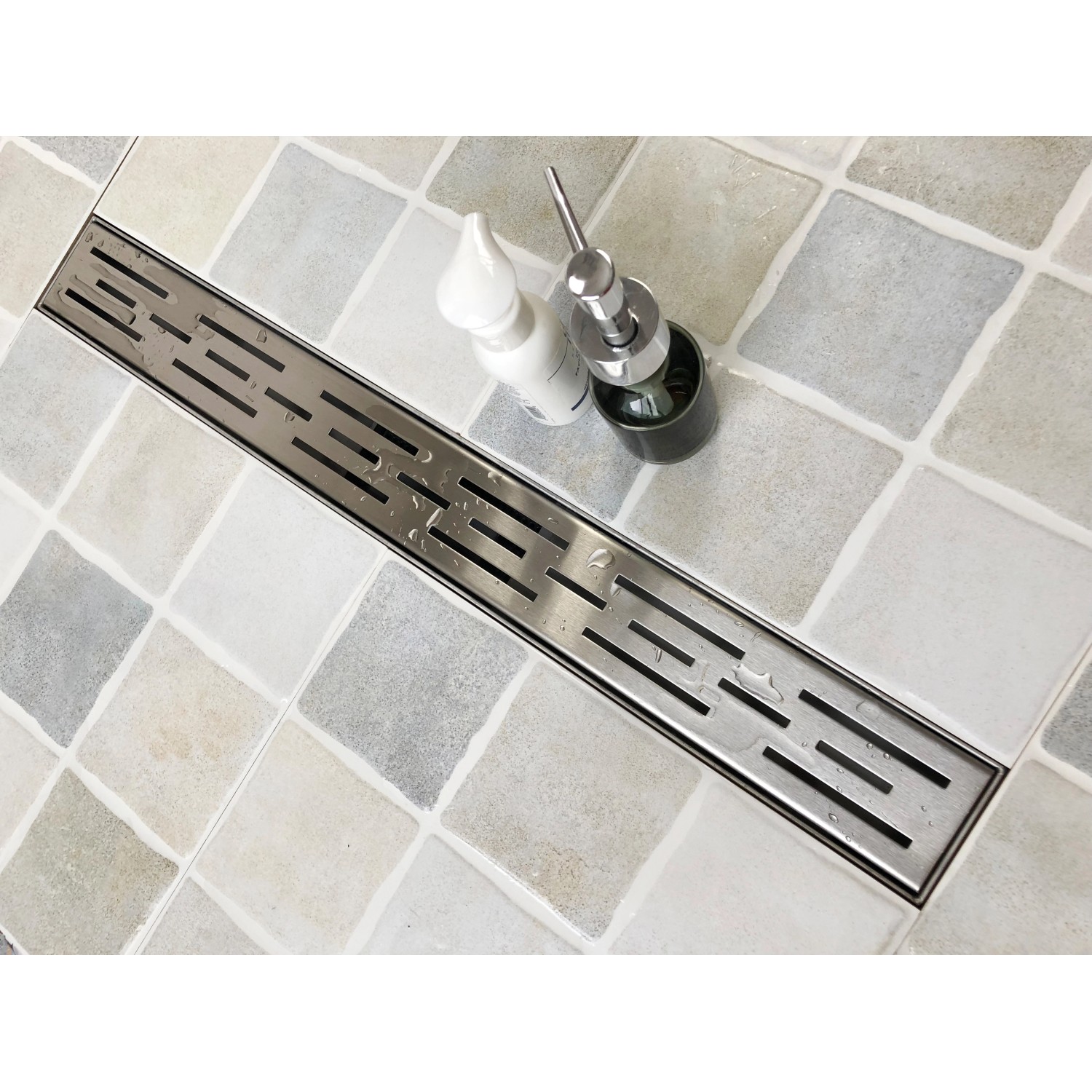 Verosan+ Duschrinne Isel, 100 cm, aus Edelstahl mit modernem Designrost für bodengleiche Dusche.