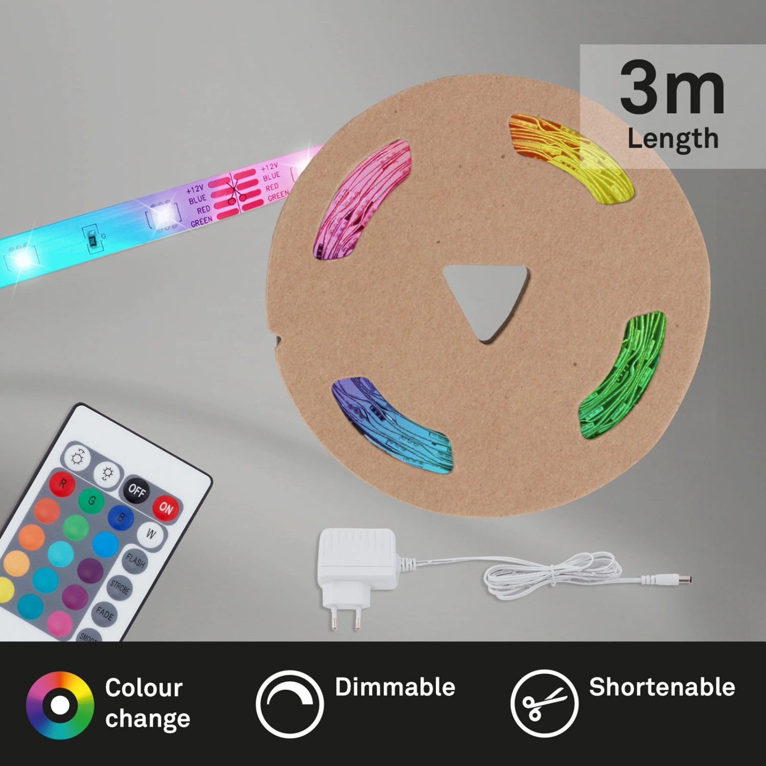 Brilo RGB-LED Flexband 3m mit Fernbedienung, Netzteil und aufgewickelt auf einer Papprolle.