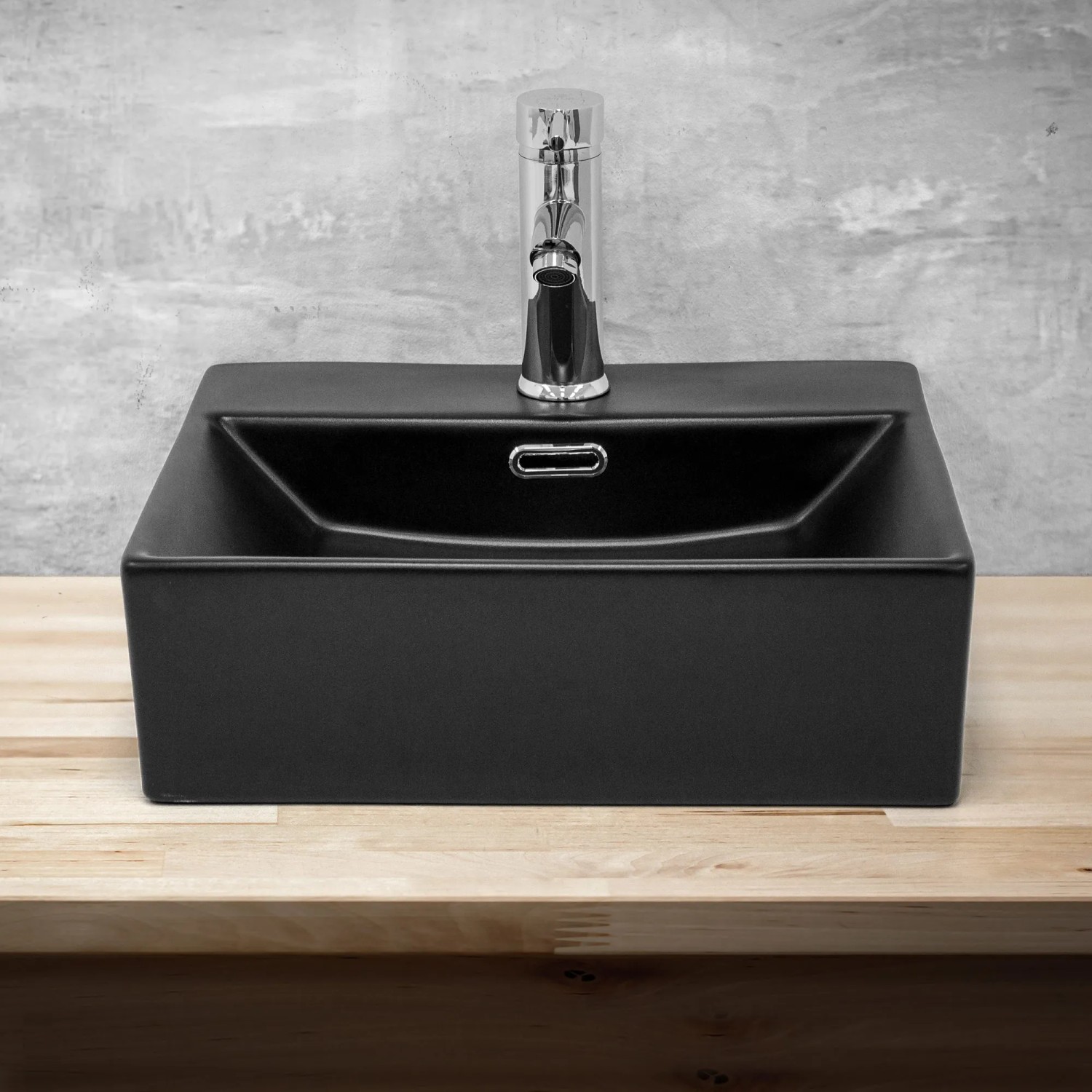 Schwarzes, eckiges ML-Design Keramik Waschbecken (415x365x130mm) als Aufsatzwaschbecken.