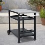 Schwarzer Taino Nikan Grillwagen mit Edelstahl-Arbeitsplatte, Rollen, Haken und Flaschenhalter für Outdoor-Grillzubehör.