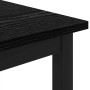 Detailansicht: Schwarzer Couchtisch in Eichenoptik, Holzwerkstoff, Tischbein.