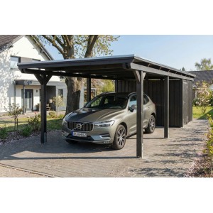 Anthrazitfarbener Skan Holz Carport Emsland aus Leimholz mit Flachdach, EPDM-Dach und integriertem Abstellraum, ein Auto darunter.