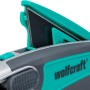 Wolfcraft Profi-Dual-Sicherheitsmesser mit Trapezklinge, graues Metallgehäuse und grünen Akzenten.