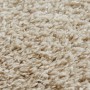 Detailaufnahme: Beiger Andiamo Teppich Chia mit hohem, flauschigem Flor (60x110 cm).