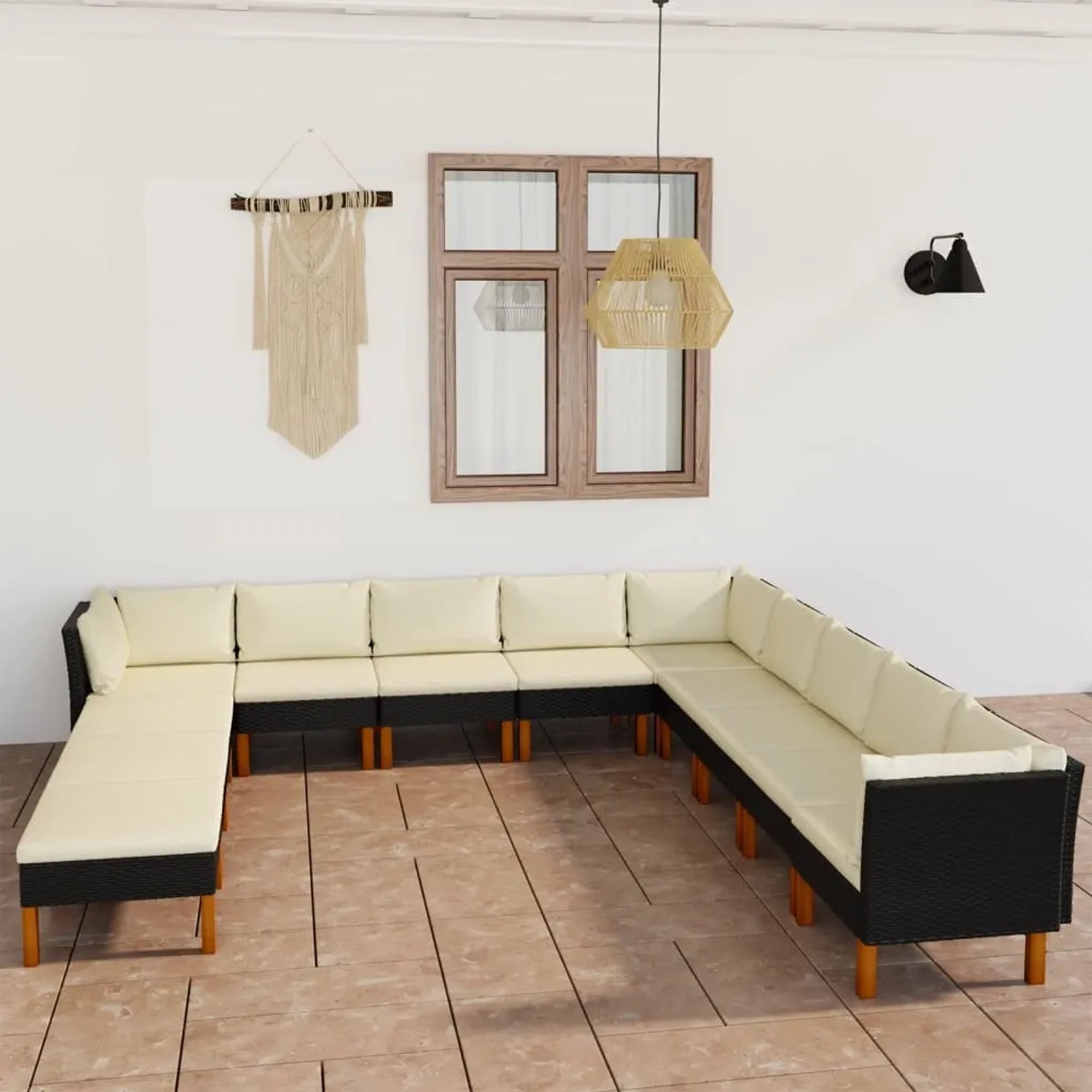 Schwarzes 12-tlg. vidaXL Garten-Lounge-Set mit cremeweißen Kissen aus Polyrattan.