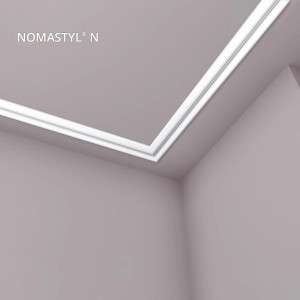 Weiße NOEL & MARQUET Eckleiste NOMASTYL N an Decke und Wand.
