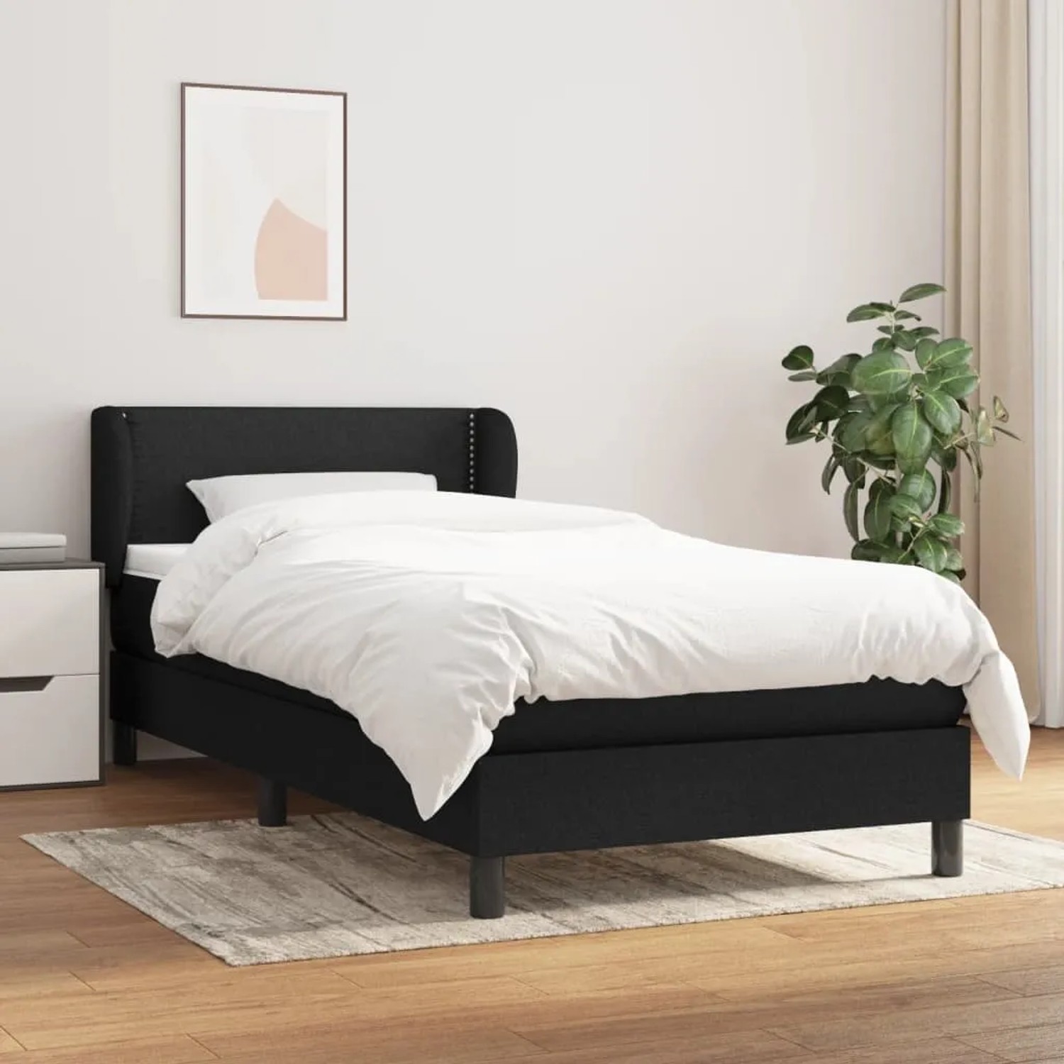 Schwarzes vidaXL Boxspringbett (80x200 cm) mit Matratze und Kopfteil im Schlafzimmer.
