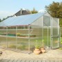 KGT Gewächshaus Orchidee Alu blank, 12,74 m², mit Pflanzen und Regalen im Garten.