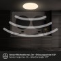 Weiße Brilo LED-Deckenleuchte Walk mit Bewegungsmelder in modernem Bad. Zeigt Sensorreichweite 3m und 120° Erfassungswinkel.