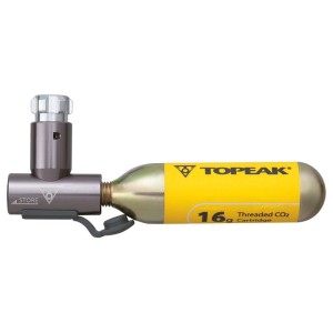 Graue Topeak CO2 Kartuschenpumpe Air Booster mit angeschlossener gelber 16g CO2 Kartusche. Fahrrad Luftpumpe.