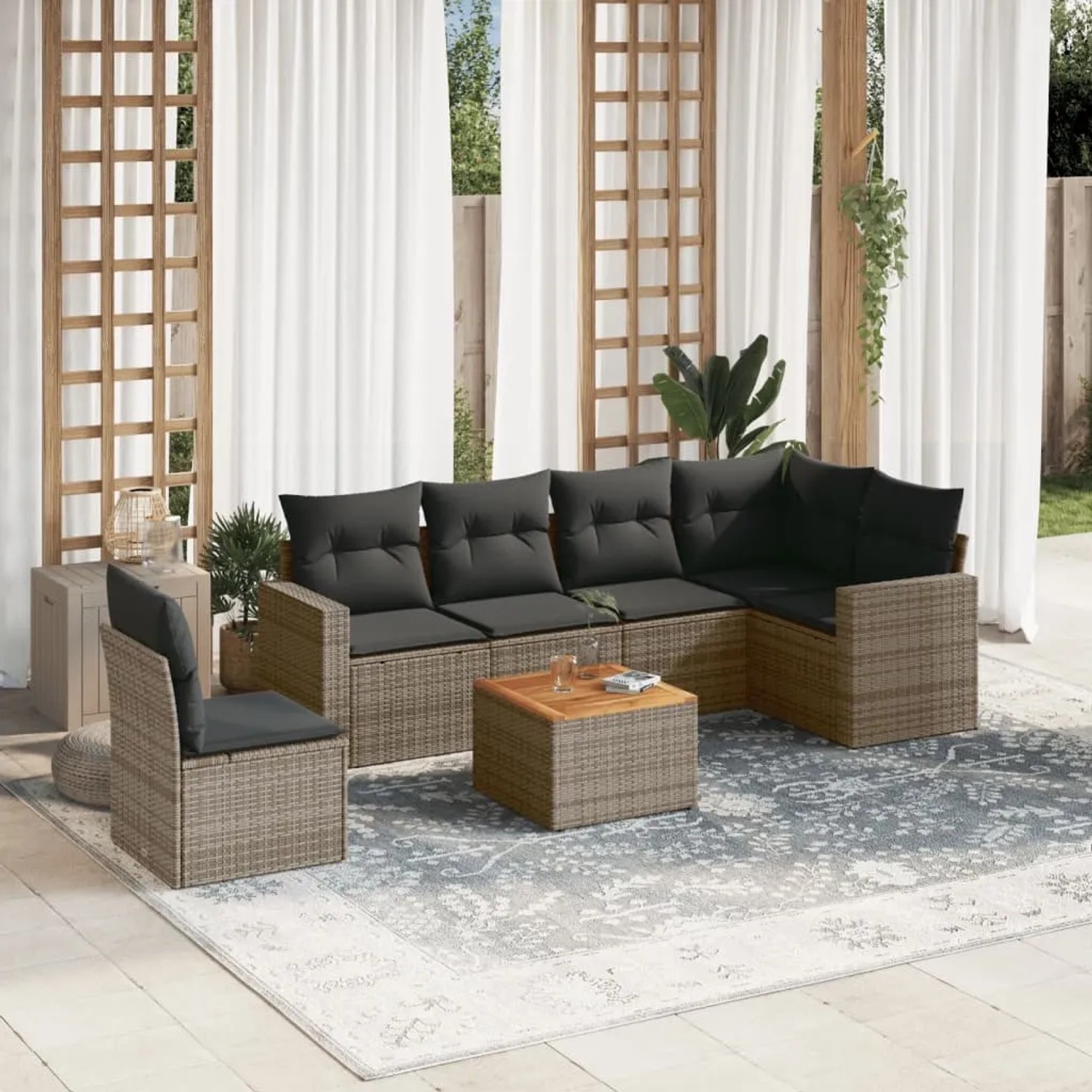 Graue 7-teilige vidaXL Garten-Sofagarnitur aus Polyrattan mit Kissen und Tisch.