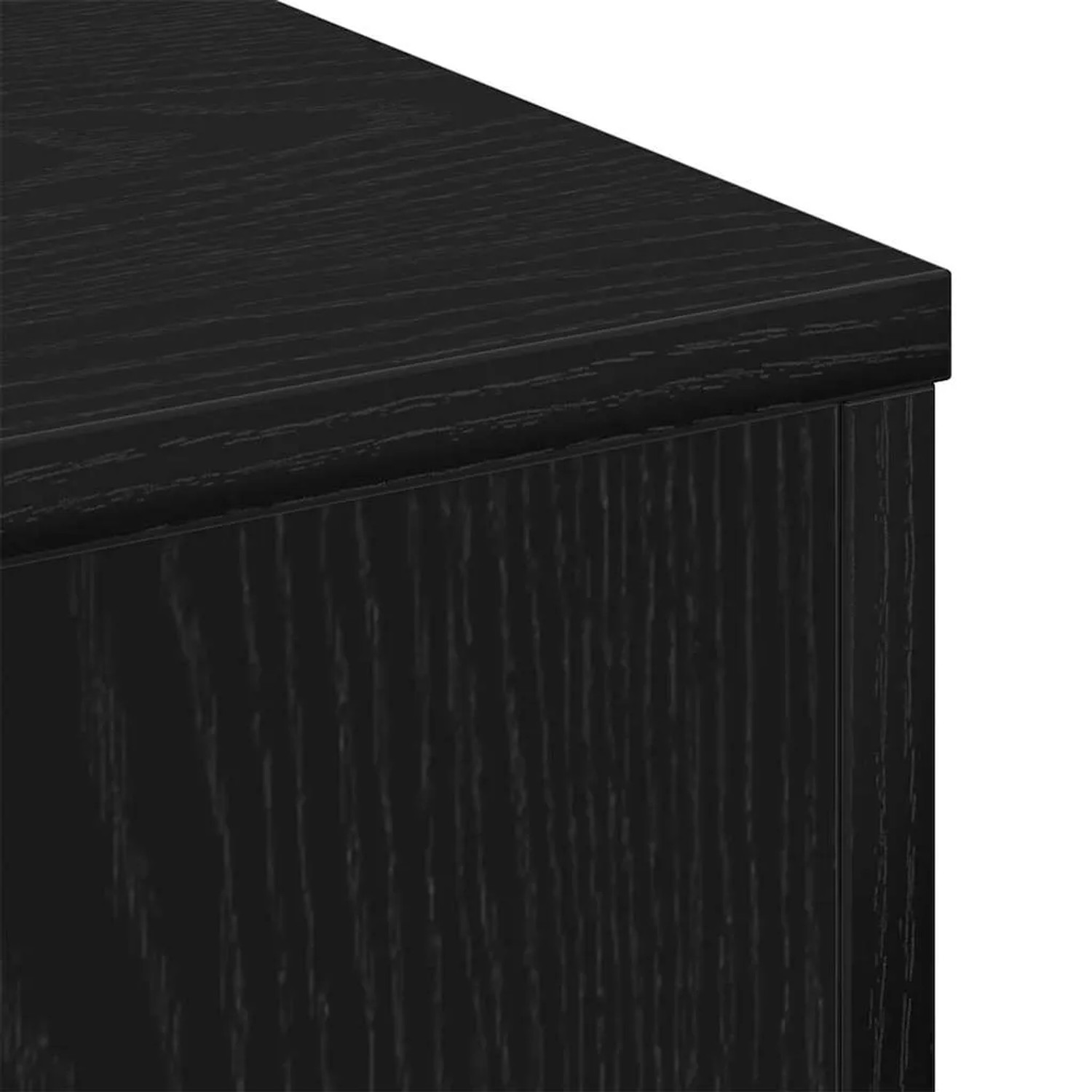 Detailansicht: Schwarzer Couchtisch in Eichen-Optik aus Holzwerkstoff.