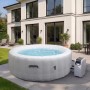 Aufblasbarer, runder, grau-weißer MCW Whirlpool N97 für 4 Personen im Garten.