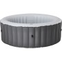 Runder, grauer MSpa Lite Glow AirJet Whirlpool mit Hydromassage, selbstaufblasend.