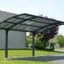 Palram Canopia Carport Arizone Wave mit gebogenem, transparentem Dach und anthrazitfarbenem Gestell.