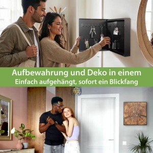Schwarzer Banjado Metall Schlüsselkasten mit Jahresringe Motiv, offen mit 32 Haken, in moderner Garderobe. Ein Paar hängt Schlüssel ein.