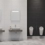 Chromfarbene Ideal Standard Waschtischarmatur mit verlängertem Sockel ohne Ablaufgarnitur.