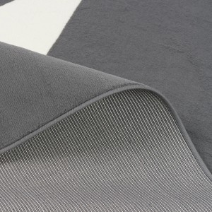 Nahaufnahme: Pergamon Kinderteppich Trendline Stern Anthrazit, 140x200cm, Kurzflor, Detailansicht der Rückseite.